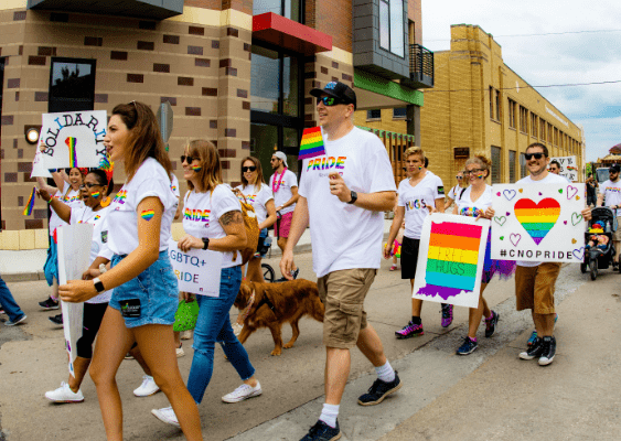 CNO marches in pride parade